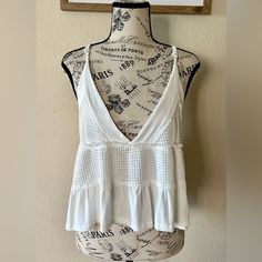 Pol White Boho Sleeveless Crop Top Size Small. Gorgeous Little Top! Nwot Excellent Condition. Adjustable Straps Deep V Neck Crop Length Crisp White Color Waffle Pattern Summer White V-neck Vest, Chic Tank Vest For Beach, Chic Cami Vest For Beach, White V-neck Summer Vest, Chic Sleeveless Crochet Top For Beach, Cotton Sleeveless Halter Top, Chic Beach Vest In Camisole Style, Chic Beach Vest Camisole, Chic Camisole Vest For Beach