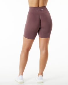 HIGHLIGHTS. High-waisted short. Form-fitting with an integral 3-tiered, tapered waistband. Seamless, knit fabric. No front seam. Back scrunch seam detail to enhance curves. Leg and glute contouring panels. 6.5” inseam. Alphalete wordmark logo branding knitted in white FIT SUGGESTION. This item runs true to Alphalete’s standard seamless fit.. If you are between sizes, we recommend sizing up.. Model is 5’8”/173cm, wearing a size S with a 26”/66cm waist and 43”/109cm hips. MATERIALS AND WASHING DIR Wordmark Logo, Word Mark Logo, Short Form, Ombre Effect, Womens Bras, Women Collection, Logo Branding, Women Fashion, Knit Fabric