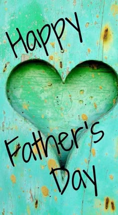 a heart shaped door with the words happy father's day written in black on it