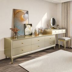 a bedroom with a dresser, mirror and stool