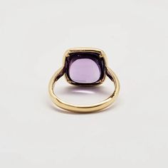 PURPLE PARADISE WHAT IT IS: 18k yellow gold ring with amethyst 9.5 cts WHY IT’S SPECIAL: Exquisite in its design, this ring elevates the concept of simplicity and sophistication to the highest level. Surrounding the finger is an 18k yellow gold band, with a mesmerizing cushion-cut amethyst at its heart. Truly enchanting... GOOD TO KNOW: 18k yellow gold 3.05 gmsAmethyst 9.5 ctsRing Size: 7 WHY WE LOVE DORIAN WEBB: We can't take our eyes off Dorian Webb's purposeful creations that honor women, emb Aesthetic Rings, 18k Yellow Gold Ring, Halo Ring, Halo Rings, Ring Collections, Anniversary Ring, Ring Wedding, Signet Ring, Cushion Cut