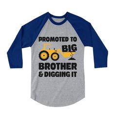 a gray and black baseball shirt with an image of a tractor that says, promote to big brother and digging it