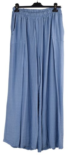 Stay cool and stylish this summer with our Pleated Wide Leg Trousers. Designed to be lightweight and breathable, they feature an elasticated waist for all-day comfort and convenient pockets. The chic wide leg style is perfect for any occasion, making it a must-have addition to your wardrobe. Pleated Wide Leg Trouser Lightweight Palazzo Pants Elasticated Waist & Pockets Elasticated Waist 2 Side Pockets Pleated Design One Size  Soft and Lightweight Perfect for Spring/Summer 100% Viscose Made in It Solid Color Capris With Pockets For Vacation, Solid Capris With Pockets For Vacation, Vacation Capris With Pockets, Relaxed Fit Capris With Pockets For Vacation, Relaxed Fit Summer Harem Pants, Summer Style Relaxed Fit Harem Trousers, Summer Relaxed Fit Harem Pants, Wide Leg Capris With Pockets For Beach, Summer Baggy Pull-on Bottoms