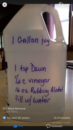 a gallon of liquid with writing on it