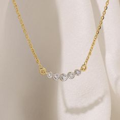 Five Points of Brilliance This necklace features five round diamonds encircled by a delicate white gold halo, elegantly suspended on a golden chain. A perfect blend of timeless sparkle and modern design. #diamondsthatdefineyou #necklace #jewerly #jewelrydesigner #diamonds Womens Diamond Necklace, Golden Chain, Gold Halo