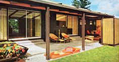 an outdoor living area with patio furniture and large sliding glass doors on the front door