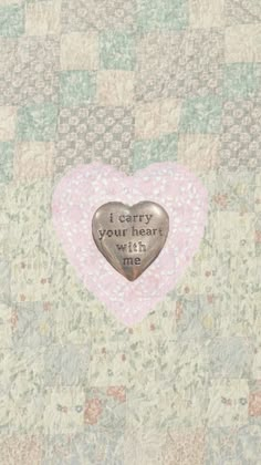 a pink heart with the words i carry you're in me written on it