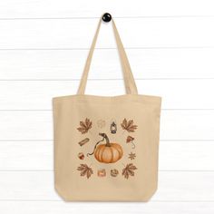 With its spacious interior and sturdy construction, this tote bag is perfect for carrying your essentials while showcasing your love for autumn. The organic cotton material provides a soft, yet durable texture, making it comfortable to carry and resistant to everyday wear and tear. Whether you're heading to a pumpkin patch, running errands, or simply enjoying a crisp autumn day, this cute tote bag is a stylish and practical companion. Its generous size accommodates groceries, books, or even your Everyday Fall Tote Canvas Bag, Everyday Fall Canvas Tote Bag, Fall Everyday Canvas Tote Bag, Trendy Cotton Bags For Fall, Trendy Fall Cotton Bags, Trendy Cotton Fall Bags, Fall Canvas Tote Bag For Daily Use, Fall Canvas Tote Shoulder Bag, Fall Tote Bag As Gift