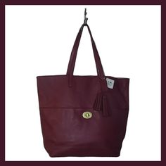 Coach Tote Handbag Dust Bag An Care Instructions Included Can Easily Fit Laptop An Other Personal Items. Genuine Leather Pretty Red/Burgundy Color, Magnetic Top Closure Exterior Has Front Slip Pocket With Gold Tone Closure Interior Has 2 Slip Pockets An A Zip Closure Burgundy Tote Bags For On-the-go, Burgundy Satchel With Handles For Shopping, Burgundy Double Handle Shopping Bags, Burgundy Shoulder Bag For Shopping, Burgundy Bucket Bag Tote With Removable Pouch, Burgundy Bucket Tote Bag For Travel, Burgundy Bucket Bag Tote For Travel, Burgundy Tote Shoulder Bag For Errands, Burgundy Tote Bag For Travel