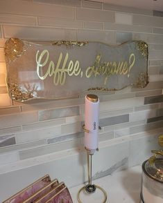 there is a sign that says coffee always on the wall next to some other items