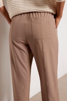 Step up your weekend style with the Oakland Turnup Taper Pant from Varley, featuring a high-rise fit, an elastic waistband with an adjustable drawstring, and an ankle length hem with a cuff. | VARLEY Women's Cypress Turnup Taper Pants, Size Small, Taupe High-waisted Pants With Ribbed Waistband, Relaxed Fit High-waisted Pants With Elastic Cuffs, Comfort Stretch Solid Bottoms For Daywear, Tapered Leg Pants With Elastic Waistband For Daywear, Comfort Stretch Pants With Ribbed Waistband For Work, Stretch High-waisted Pants For Daywear, Versatile Pull-on Bottoms For Daywear, Ankle-length Pants With Ribbed Waistband, Beige Tapered Leg Pants With Elastic Waistband