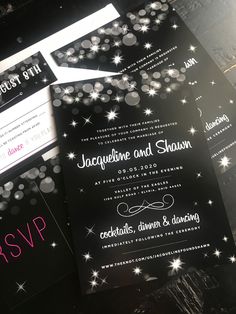 black and white wedding stationery with silver sparkles on the front, pink ribbon in the back