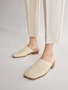 Giselle Square-toe Mules in Cream Ivory | Women's Sustainable and Stylish Shoes | VIVAIA Beige Slip-ons For Office In Spring, Beige Office Slip-ons For Spring, Spring Low Heel Mules With Rubber Sole, Spring Office Mules With Rubber Sole, Office Spring Mules With Rubber Sole, Classic Closed Toe Slip-ons For Spring, Spring Mules With Rubber Sole And Medium Width, White Slip-ons For Office In Spring, Comfortable Mules For Workwear