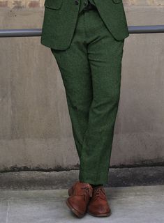 Flaunt your elegant dressing sense with great zeal by simply donning our Harris Tweed Wide Herringbone Royal Green Pants. Crafted from 100% wool, the pants add a touch of class to your wardrobe and you will definitely be the recipient of compliments all day long, thanks to the rich fresh hue and the herringbone weave on the outfit.    Look Includes  Harris Tweed Wide Herringbone Royal Green Fabric  Cross Pocket  Flat Front  Two Welted Back Pockets on Trousers   You can change the look during cus Elegant Dressing, Fabric Cross, Italian Suit, Dressing Sense, Royal Green, Green Suit, Button Jacket, Green Pants, Harris Tweed