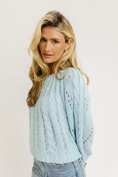 soft + sweet, this slouchy light blue sweater will be your new go-to for any spring outfit. featuring cable knit stitching + eyelet details, it’s lightweight + perfect for layering. dress it up with skirts + ballet flats, or down with jeans + sneakers. sky // scoop neckline, drop shoulder, balloon sleeve paired with our sicily denim model is 5'8" + wearing a small measurements are approximate + taken while laying flat small : bust 43” length 21” medium : bust 44” length 21” large : bust 45" leng Acrylic Fabric, Go For It, Light Blue Sweater, Knit Stitch, Blue Sweater, Large Bust, Small Bust, Blue Sweaters, Spring Outfit