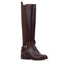 These tall shaft boots offer a sleek silhouette and a practical elastic gore backing for a snug fit. The chic ankle strap with a buckle detail adds a touch of sophistication, perfect for both casual outings and formal occasions. From Torgeis. Wide Calf Mid-calf Boots With Buckle For Fall, Wide Calf Fall Boots With Buckle Closure, Fitted Moto Boots For Fall Workwear, Fall Moto Boots For Workwear, Knee-high Moto Boots For Workwear In Fall, Knee-high Boots With Buckle Closure For Fall, Fitted Business Boots With Buckle Closure, Formal Moto Boots With Buckle Closure For Fall, Business Boots With Buckle Closure