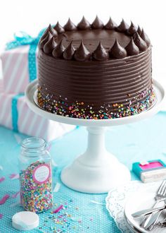 a chocolate cake with sprinkles on top