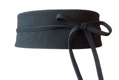 Obi Belt, Eko Leather belt, Black belt,  Women's belt, Wide faux leather belt, Tie belt, Wide Wrap belt, Wide belt Unique reversible wide wrap belt made of black high-quality eco-leather.  Obi's are a great way to slim visually the waistline, so they are a flattering source for different looks, also are in style to give a nice look to blouses, tunics, cardigans or dresses... The black color is perfect for matching with a large range of colors and styles. It is made with a wide central panel, to Adjustable Belt For Work, Adjustable Self Belt For Workwear, Adjustable Formal Sash Belt, Adjustable Black Evening Belt, Adjustable Black Belted Corset Belt, Belt Wide, Steampunk Leather, Belt Tie, Beautiful Belts