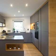 the kitchen is clean and ready for us to use in its new owner's home