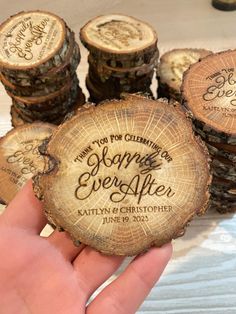 someone is holding up some wood slices with the words hope ever after on them