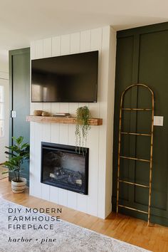 a living room with a fireplace and tv mounted on the wall