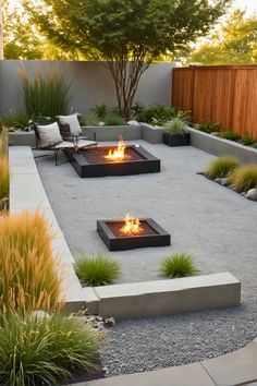 an outdoor fire pit surrounded by gravel and plants