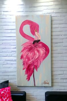 a painting of a pink flamingo sitting on top of a black chair in front of a white brick wall