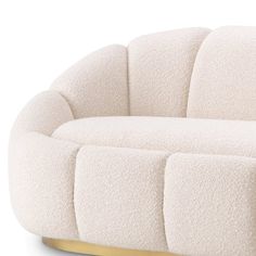 a white couch with gold legs on a white background, it looks like something from the future