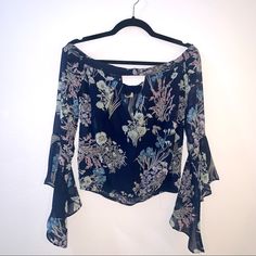 Sexy Boutique Top. Floral Print With Bell Sleeves. Off The Shoulder Style With Deep V In The Front For Perfect Cleavage. Nwt And So Cute! Spring Off-shoulder Blouse For Night Out, Chic Floral Print Tops For Party, Chic Floral Print Tops For Night Out, Off-shoulder Floral Print Party Tops, Floral Print Crop Top For Party, Floral Print Summer Tops For Night Out, Off-shoulder Floral Print Party Blouse, Fitted Floral Print Blouse For Night Out, Chic Floral Print Blouse For Date Night