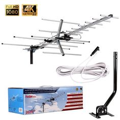 an image of a tv antenna set with remote control and box on white background for sale