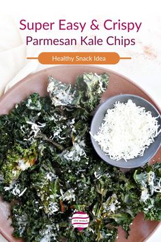 a pink plate topped with kale chips and shredded parmesan cheese on top