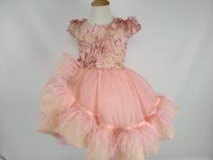 This toddler dress with feathers is made from luxurious 3D lace fabric, a skirt in pink organza ruffles with feathers, and lined soft cotton. Pink Organza Dress, Dress Feathers, Dress With Feathers, Toddler Flower Girl Dresses, Feather Flower, Organza Dress, Flower Girl Dress, Toddler Dress, Fancy Dresses