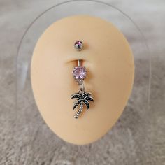 "Are you looking for a cute and dainty belly ring to add to your jewelry collection? Check out this beachy pink gem belly ring with palm tree charm!  Length is about 2\". 14g  bar length: 3/8\" 10mm **Great gift for yourself or a friend!  Choose the gift message option when you check out if you want me to include a FREE gift bag.** Y2k Kawaii Beach Tropical Summer Ocean aesthetics" Adjustable Dangle Belly Rings As Gift, Adjustable Nickel-free Dangle Belly Rings, Adjustable Sterling Silver Dangle Belly Rings, Adjustable Pink Body Jewelry For Gift, Nickel-free Pink Belly Rings As Gift, Adjustable Nickel-free Pink Belly Rings, Summer Belly Rings, Ocean Aesthetics, Silver Y2k