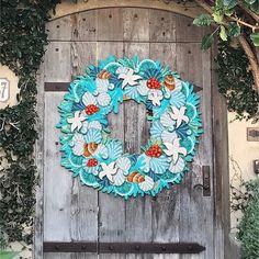 a wooden door with a wreath on it