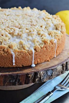 a cake sitting on top of a wooden cutting board