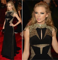 a woman in a black and gold gown with an open back, standing on a red carpet