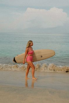 Our Putu surf bikini top is a sports bra style top, designed for use in and out of the surf. It offers full coverage for your bust, ensuring both comfort and confidence as you soak up the sun. Mix and match effortlessly with any of our Putu Watermelon print bottoms, allowing you to curate the perfect ensemble for your surf escapades. Summer Surfing Swimwear, Bra Friendly Summer Swimwear For Surfing, Bra-friendly Summer Swimwear For Surfing, Beachwear Sports Bra For Beach Season, Beachy Tankini For Surfing, Beach Season Sports Bra For Beachwear, Surfing Swimwear With Built-in Bra, Surf Bikinis, Watermelon Print