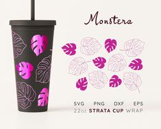 a black cup with pink and purple leaves on it