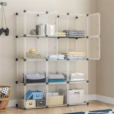 an organized shelving unit in a living room