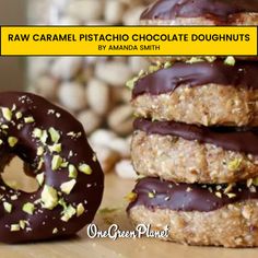 three chocolate covered doughnuts stacked on top of each other with the words raw caramel pistachio chocolate doughnuts by amanda smith