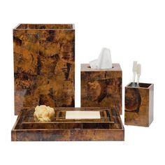 an assortment of bathroom accessories including soap, toothbrush and tissue dispenser