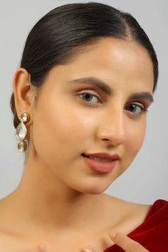 This pretty handcrafted drop shaped earrings, This surreal combination will give you perfect festive look. Product Features: Color: Golden Material: Metal - Copper And Alloy Work: Kundan With Meenakari On Back Side Measurement: Length - 1.25in, Width - 0.6in Package Contents: 1 Pair Earrings Fastening: Earrings - Push Back Care Instructions: Spot-Cleaning only. Keep away from fragrance and water.Store in a dry plastic pouch. Occasion: Festivewear , Partywear, Casual, Wedding Guest Product Type: Back Care, Plastic Pouch, Festive Look, Kundan Earrings, Innovative Fashion, Traditional Sarees, You Are Perfect, Online Earrings, Tear Drop