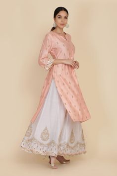 Peach pink kurta featuring zari butti embroidery all over. Paired with a ice blue sharara and a dupatta. - Aza Fashions Elegant Peach Sharara For Diwali, Elegant Pink Sets With Gota Work, Peach Straight Kurta Set For Festive Occasion, Festive Peach Straight Kurta Set, Elegant Peach Straight Kurta Set, Elegant Pink Lehenga With Straight Kurta, Festive Peach Cutdana Sets, Elegant Pink Traditional Wear For Navratri, Elegant Peach Palazzo Set For Festive Occasions