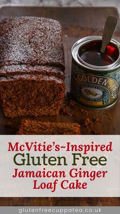 a loaf of gluten - free jamaican ginger loaf cake next to a can of coffee