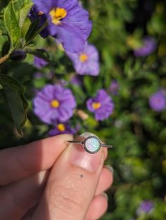 Step into effortless elegance with our Chic Opal Stacking Ring. This dainty beauty pairs the mesmerizing opal stone with sterling silver for a look that's both chic and versatile. Its sleek circle design exudes understated charm, perfect for any occasion. Whether you're going for a laid-back vibe or dressing up for a night out, this thin opal ring for women is your go-to accessory. Wear it solo for a touch of whimsy or stack it with your favorites for a look that's uniquely you. Elevate your style with our Chic Opal Silver Ring and let your personality shine through! Gift Packaging Available! Add our listing "Gift Packaging" to your order. https://www.etsy.com/listing/1715749718/gift-packaging Gifting: Looking for the perfect gift for the special women in your life? Explore our stunning co Dainty Opal Ring, Opal Stone Ring, Opal Silver Ring, Opal Stacking Ring, Silver Opal Ring, Ring Opal, Opal Stone, Opal Ring, Silver Pieces