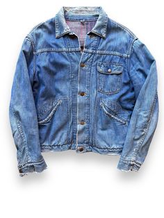 "Hands down one of the softest, well-worn denim jackets we've ever come across.  This one has been well loved and even with the repairs, still looks a beauty.  Overall, in good vintage condition.    Marked Size: N/A Chest: 42\"  Shoulder to shoulder: 24\"  Sleeves: 20\"  Length: 23\" Item is for sale at Barn Owl Vintage Goods in Georgetown. Seattle's Home for Vintage Wrangler Blanket Lined Denim Chore Coats!  Every attempt has been made to document every flaw, but we are, alas, human so there exists the possibility we have not gotten everything.  All sales are final.  No refunds or exchanges." Vintage Wrangler Jacket, Rugged Denim Jacket With Pockets In Medium Wash, Vintage Washed Relaxed Fit Denim Jacket, Rugged Medium Wash Denim Jacket With Pockets, Vintage Washed Denim Jacket Relaxed Fit, Rugged Medium Wash Denim Jacket, Vintage Recycled Denim Long Sleeve Outerwear, Vintage Long Sleeve Recycled Denim Outerwear, Vintage Long Sleeve Recycled Denim Jacket