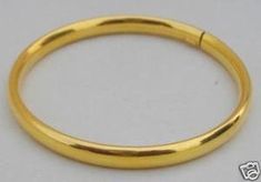 "18 CARAT PLAIN GOLD BANGLE OR BRACELET FROM RAJASTHAN INDIA. Inner diameter side to side-5.9 cm (2.36\") Inner circumference-18.52 cm (7.40\") Width-0.6 cm(0.24\") Outer diameter side to side-6.8 cm(2.72\") Thickness-0.5 cm (0.19\") Weight-20.8 Grams Material-18 carat yello Gold. We are the manufacturer of these pieces and can make in all different sizes." Gold Hoop Cuff Bracelet Gift, Gold Hoop Cuff Bracelet As Gift, Gold Hoop Cuff Bracelet For Formal Events, Gold Hoop Cuff Bracelet For Formal Occasions, Plain Gold Bangles, 22k Gold Bangles, Silver Gold Jewelry, Bangle Ring, Jewelry Bracelets Gold