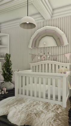 a baby's room with a white crib in the middle and a potted plant next to it