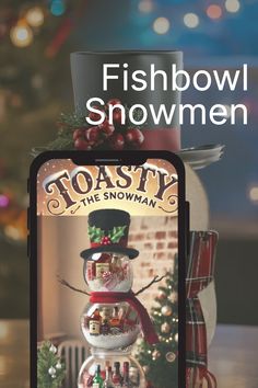 a snowman is on top of a christmas tree and has the words toasty in front of it