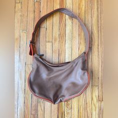 Vintage Loewe Chocolate Brown Buttery Leather Bag Orange Contrast Trim Gorgeous Bag With Barely Any Wear Designer Brown Soft Leather Hobo Bag, Designer Soft Leather Brown Hobo Bag, Designer Brown Hobo Bag With Leather Lining, Designer Orange Bags For Everyday Use, Designer Orange Everyday Bags, Orange Hobo Shoulder Bag, Orange Soft Leather Crossbody Shoulder Bag, Orange Soft Leather Crossbody Bag, Designer Brown Hobo Bag Everyday